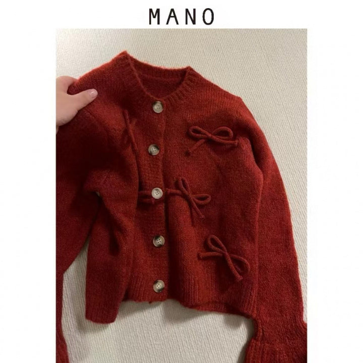 Cardigan pour femmes avec des nœuds décoratifs dessus