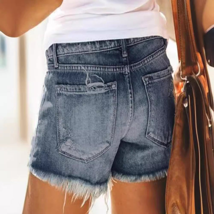 Women's Destroyed Denim Shorts in a Modern Look with Fringes Lune London