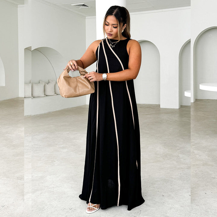 Women's maxi dress with asymmetric design and elegant contrast seams
