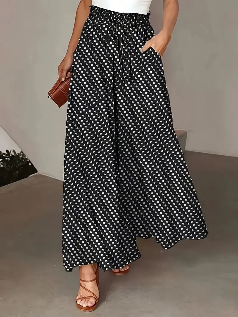 Ladies' culotte pants with elastic waist and embroidered polka dot pattern Lune London