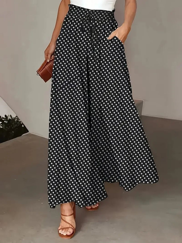 Ladies' culotte pants with elastic waist and embroidered polka dot pattern Lune London