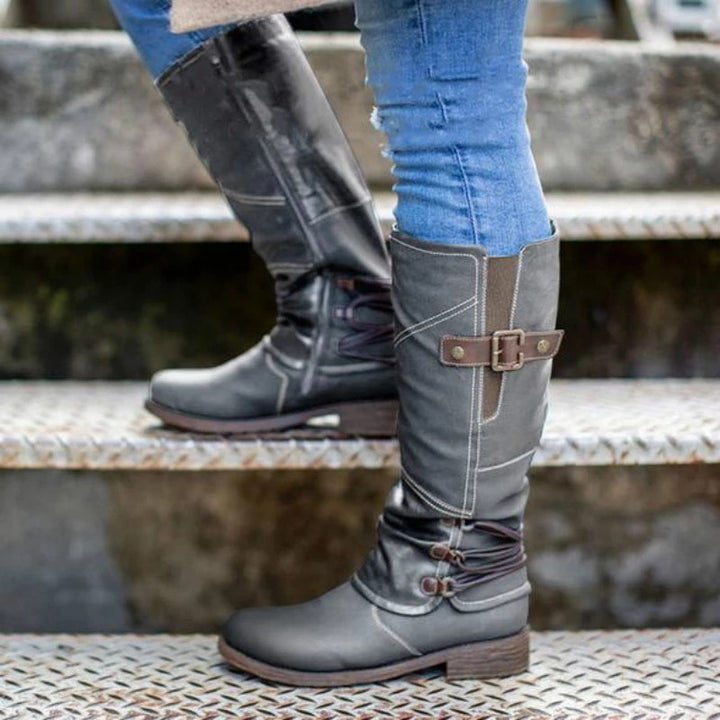High leather boots for women with decorative buckles and elastic straps Lune London