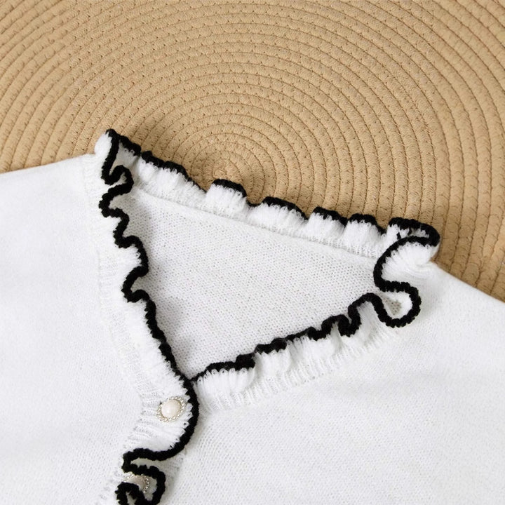 Ladies elegant sweatshirt with gathered details and pearl button Lune London