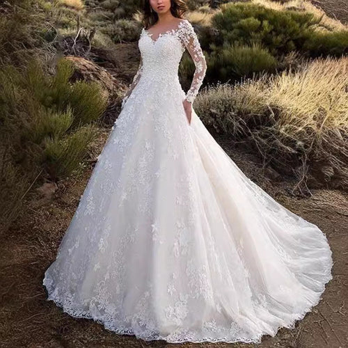Women's Wedding Dress with Elegant Lace Detailing and Voluminous Skirt Lune London