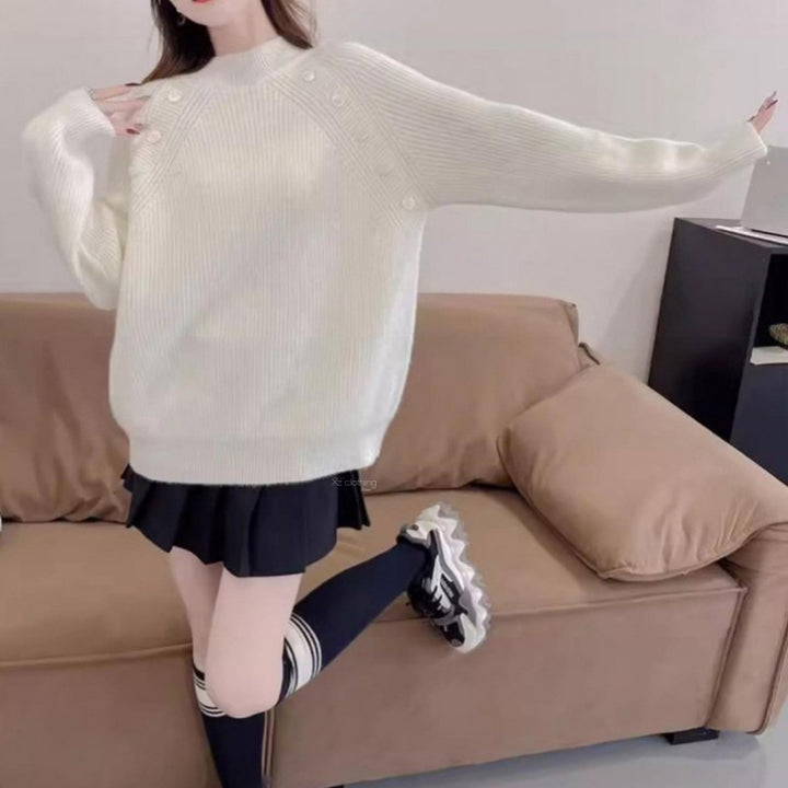 Chunky knit sweater for women with modern high collar and button details Lune London