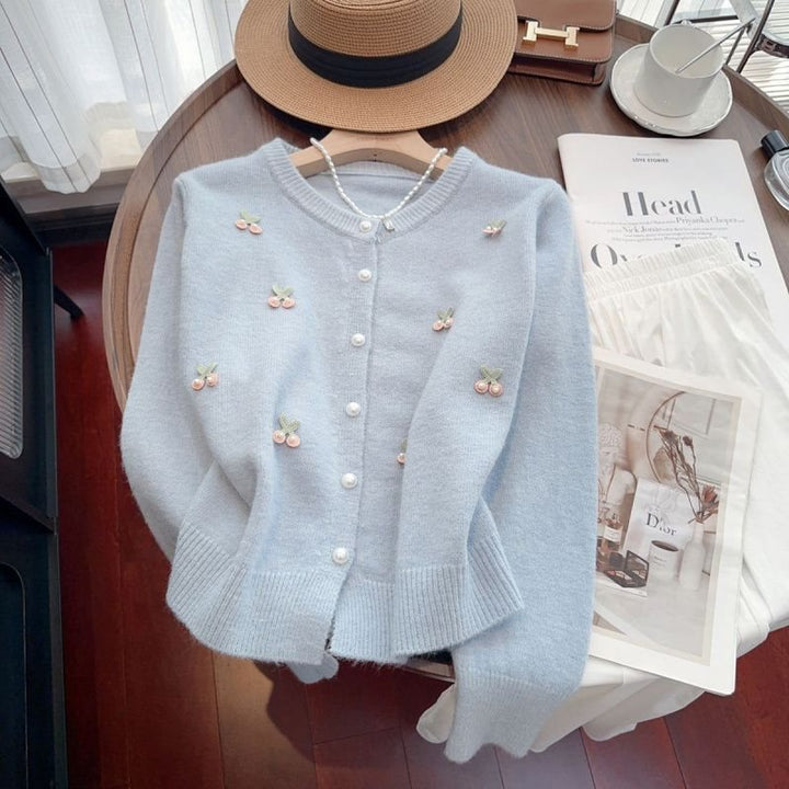 Knitted women’s jacket with floral design and pearl button details Lune London