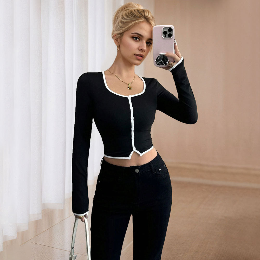 Chic & Stil cropped long sleeve women's shirt with a fine button design and a contrasting hem