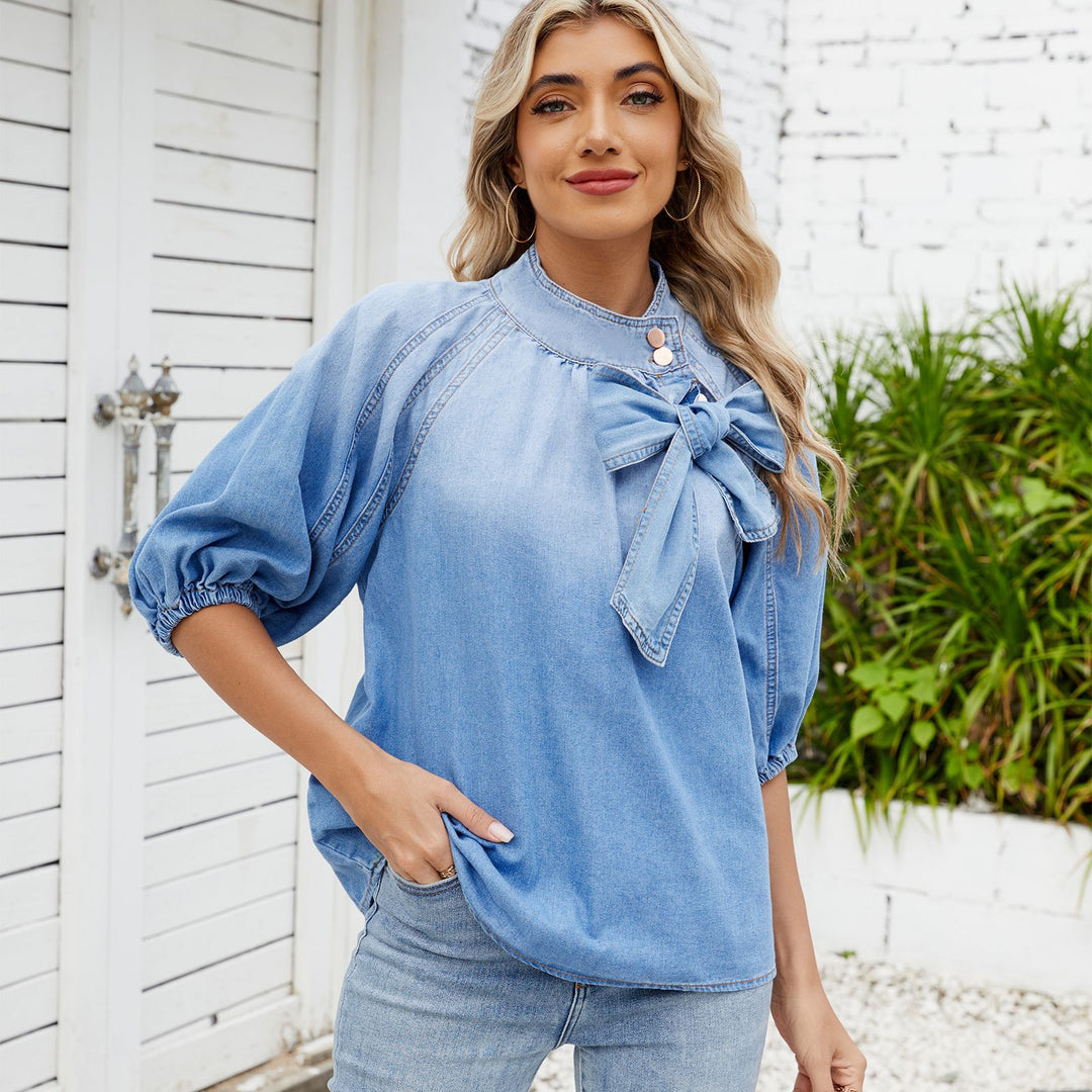Denim blouse for women with decorative knot detail and feminine puff sleeves Lune London