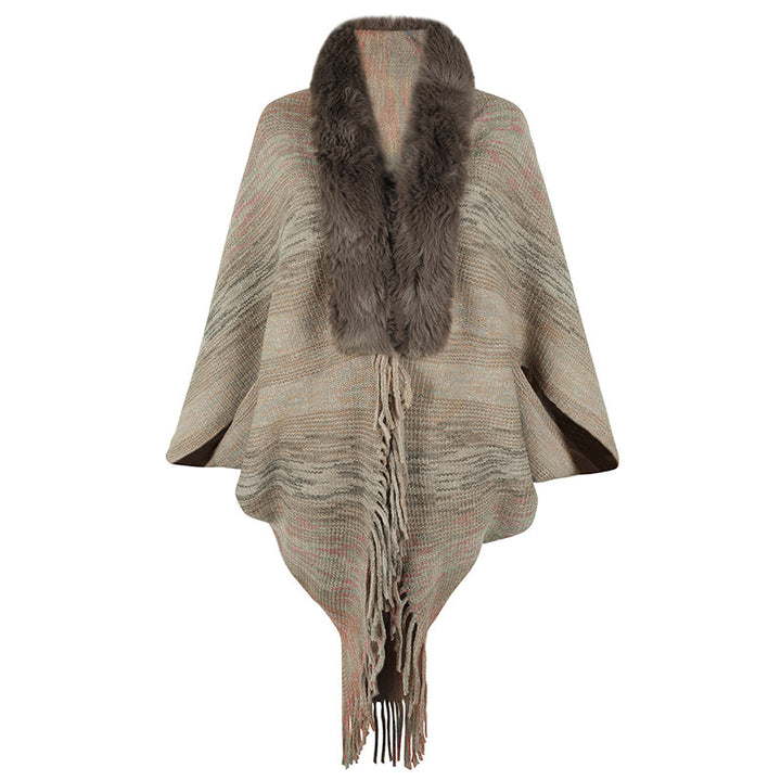 Elegant poncho for ladies with luxurious faux fur collar and fringed hem Lune London