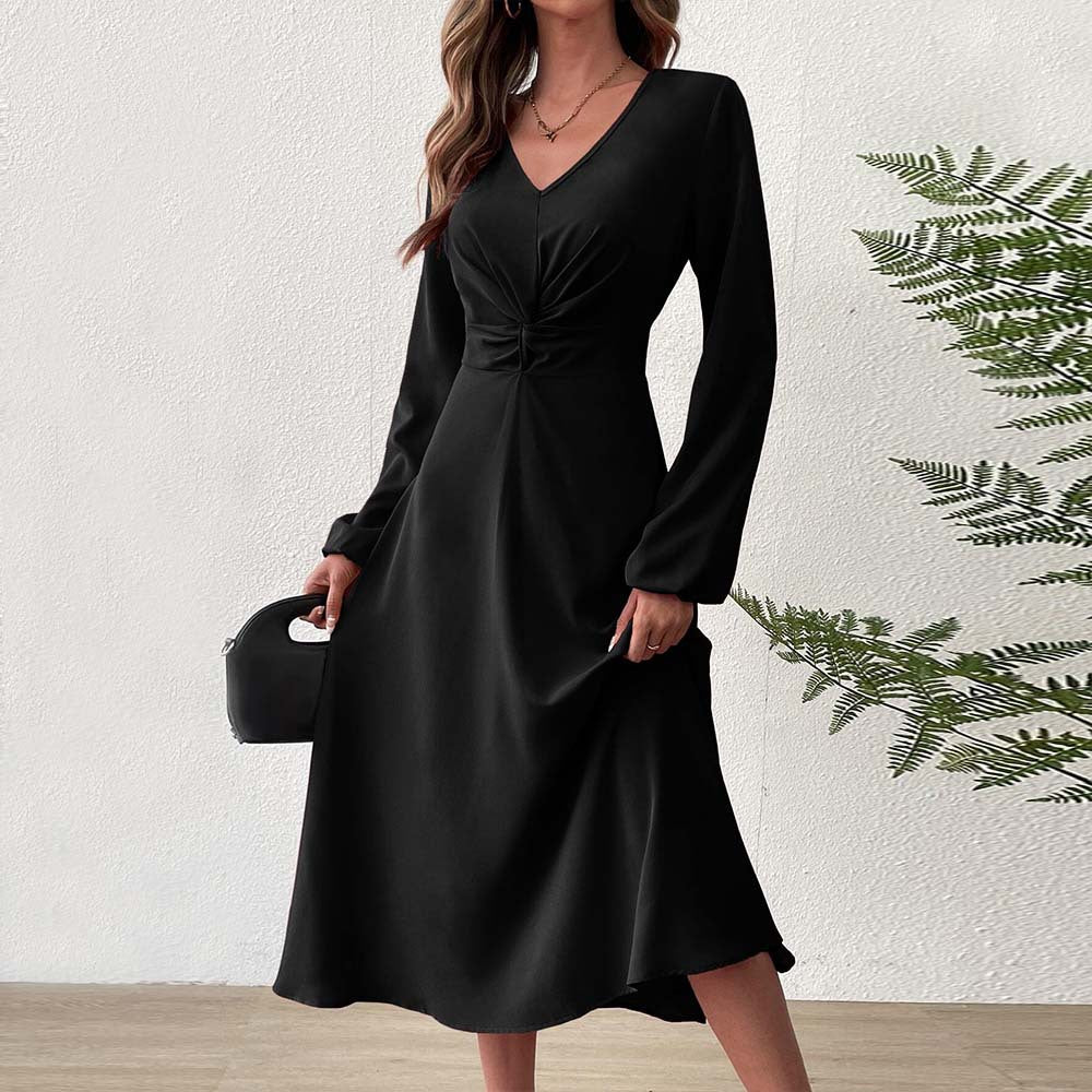 Elegant midi dress for women with a flattering drape and a deep V-neck Chic & Stil