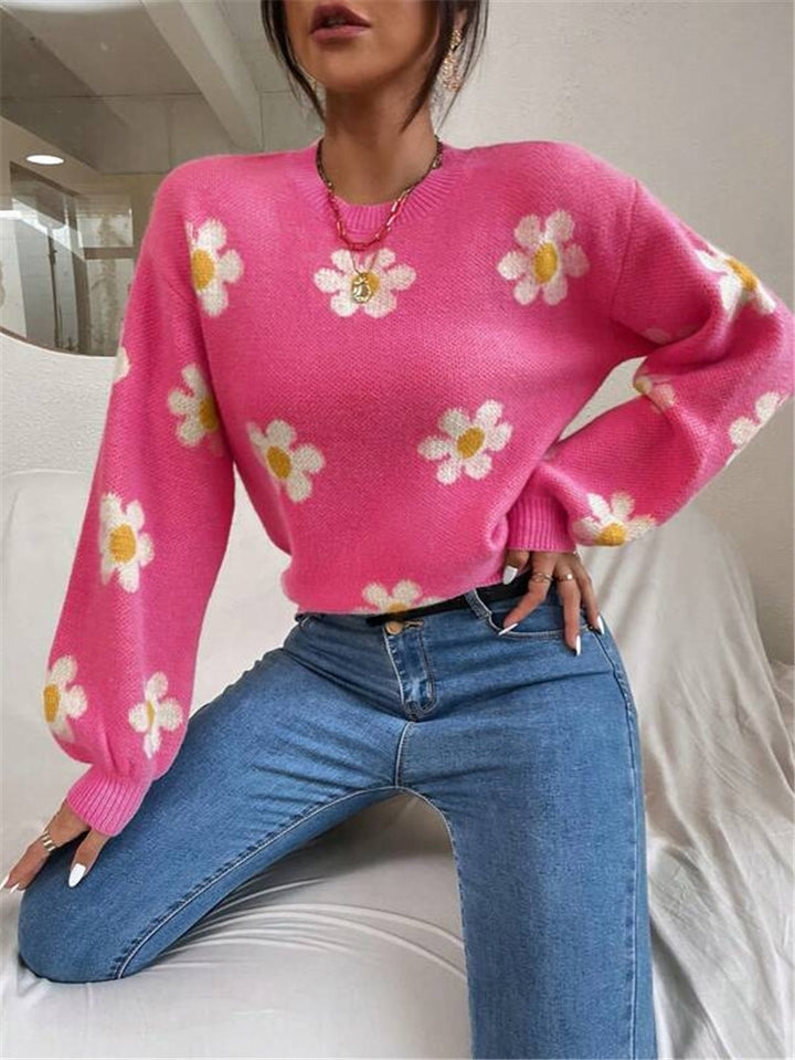 Knit sweater for women with a playful floral pattern and elegant puff sleeves Lune London