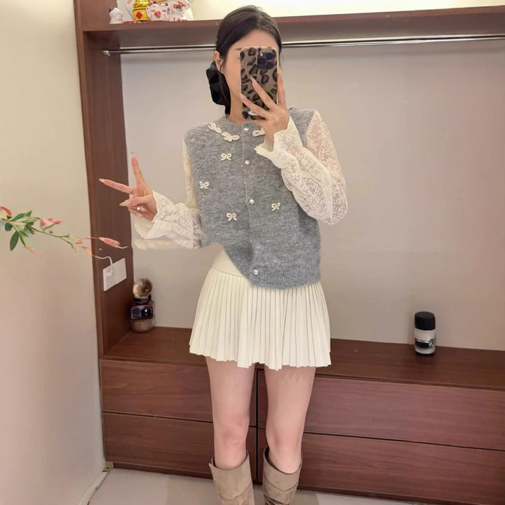Women's knitted jacket with elegant lace details and a bow Lune London