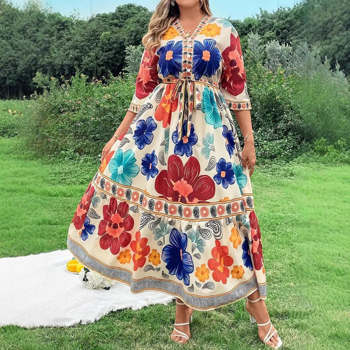 Women's maxi dress with colorful floral design and waist belt Lune London