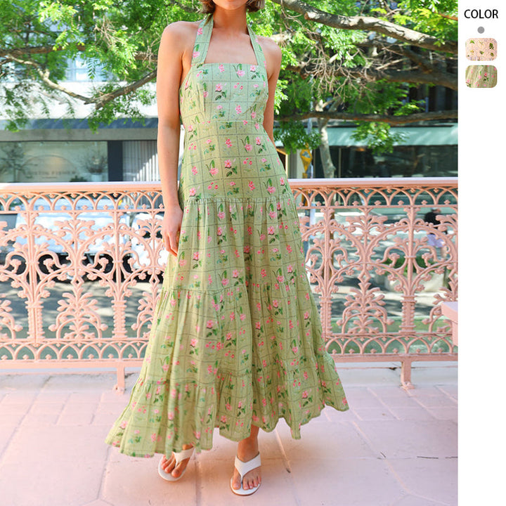 Women’s maxi dress with playful halterneck design and floral pattern mix Lune London