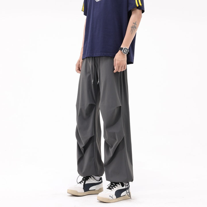Loose sports pants for men with a remarkable draped design Lune London