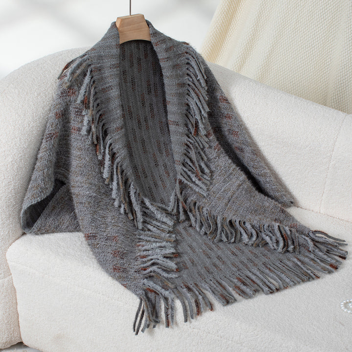 Ladies elegant poncho with fringed details and a modern plaid pattern Lune London