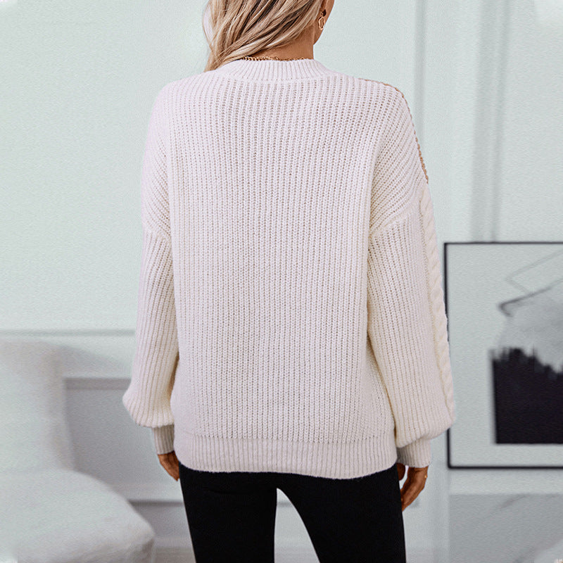 Trendy knitted sweater for women with refined twisted pattern sleeves and contrasting colors Lune London