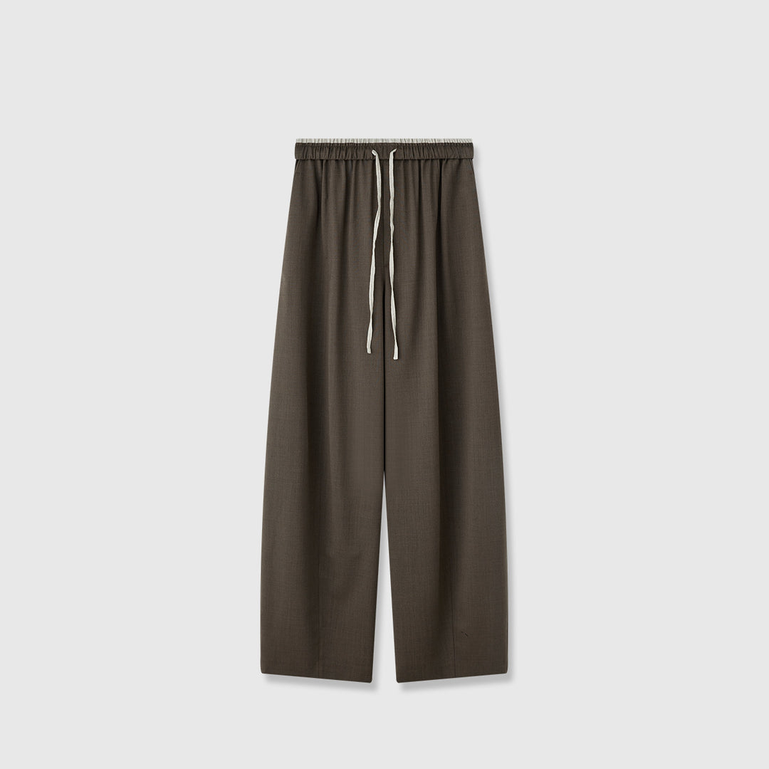 Pantalons en tissu large pour femmes avec taille élastique et poches pratiques Chic & Stil