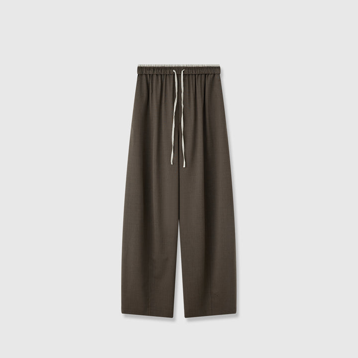 Pantalons en tissu large pour femmes avec taille élastique et poches pratiques Chic & Stil