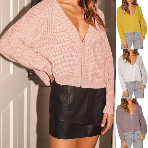 Chunky knit cardigan for women with deep V-neck and decorative button details Lune London