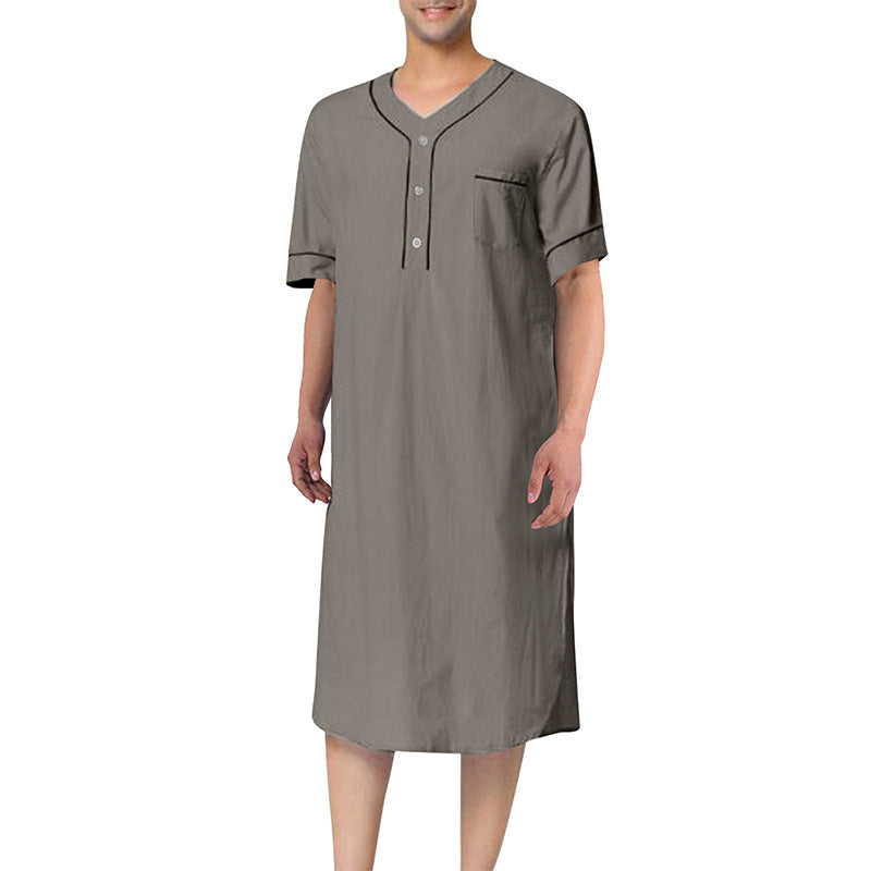 Short dress with short sleeves for women featuring a modern high collar and a practical button placket Lune London