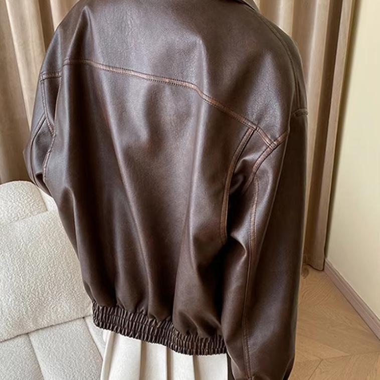 Veste en faux cuir à la mode pour femmes avec poches pratiques et coupe décontractée Chic & Stil
