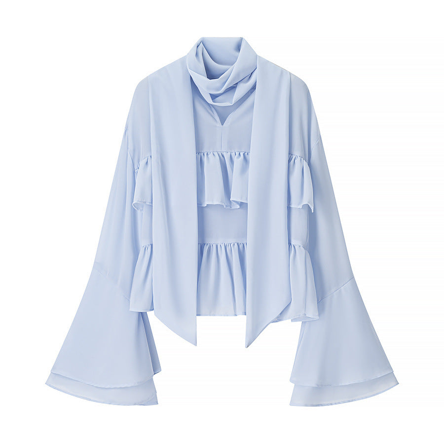 Women elegant blouse with voluminous ruffles and asymmetrical cut Lune London