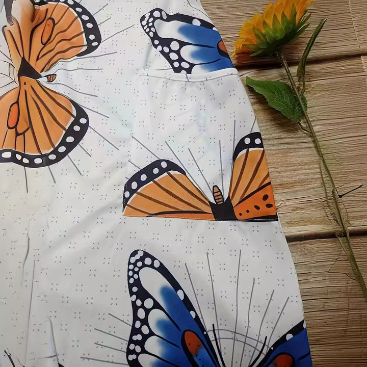 Lady jumpsuit with colorful butterfly pattern and practical pockets Lune London