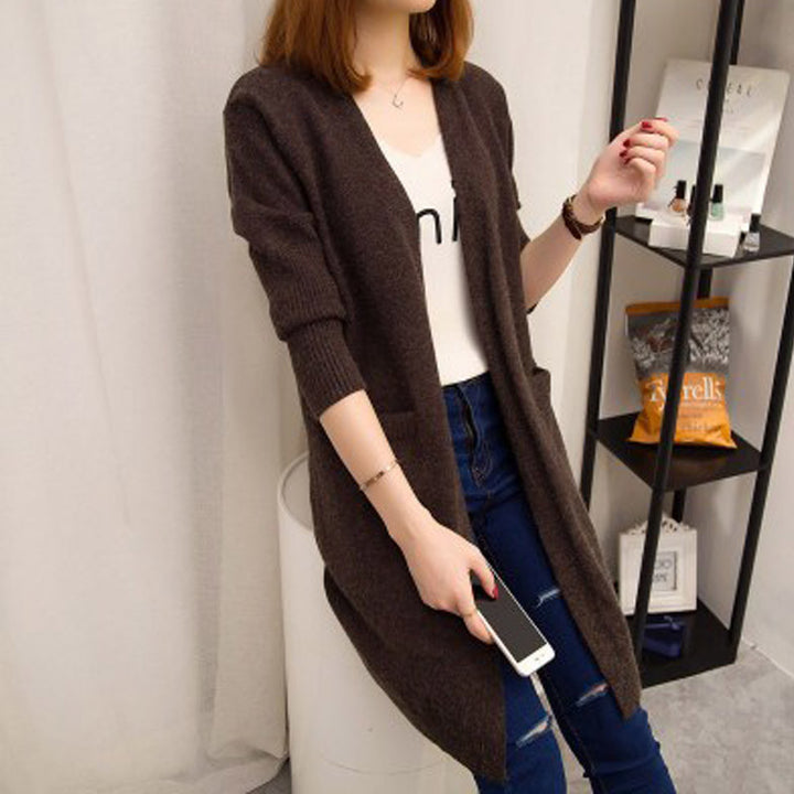 Ladies Long knitted cardigan with open front parts and deep pockets Lune London