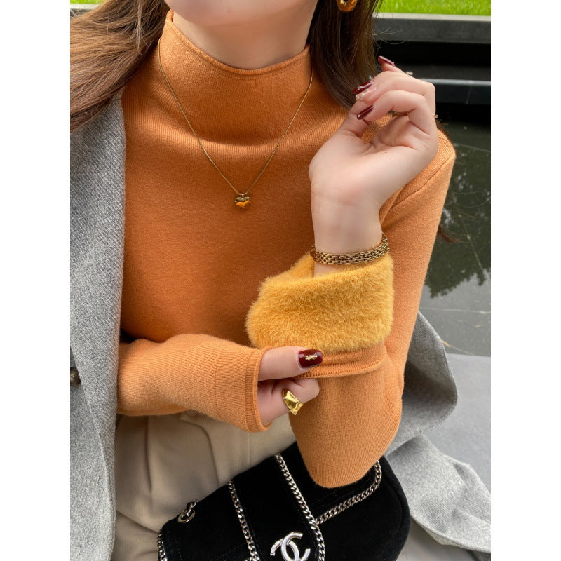 Pull élégant à col roulé pour femmes en matériau doux Chic & Stil