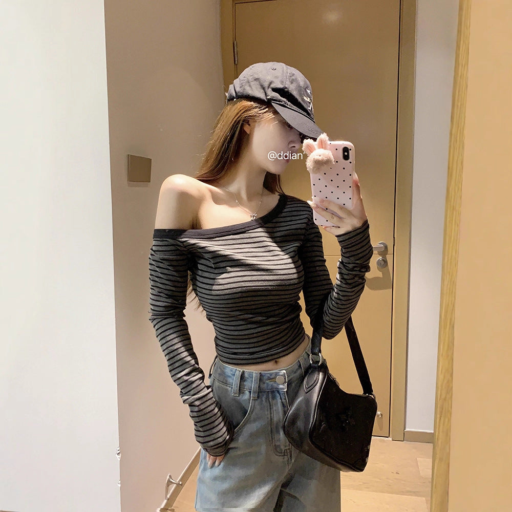 Women's asymmetrical long sleeve shirt with a light stripe pattern Chic & Stil