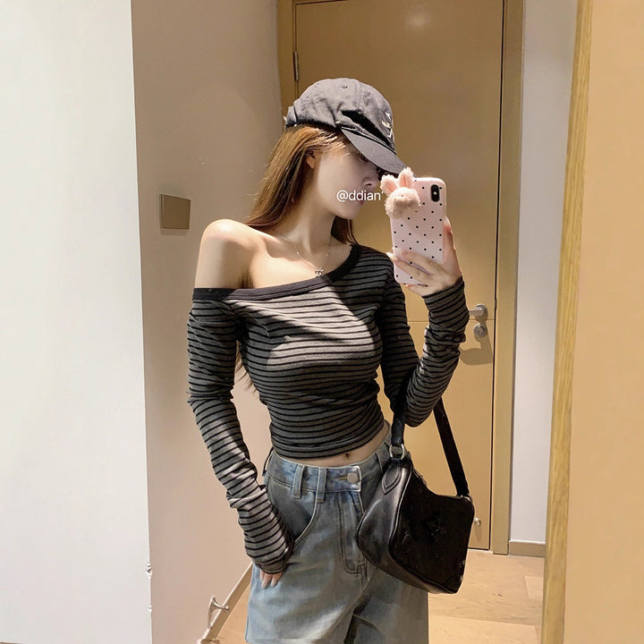 Women's asymmetrical long sleeve shirt with a light stripe pattern Chic & Stil