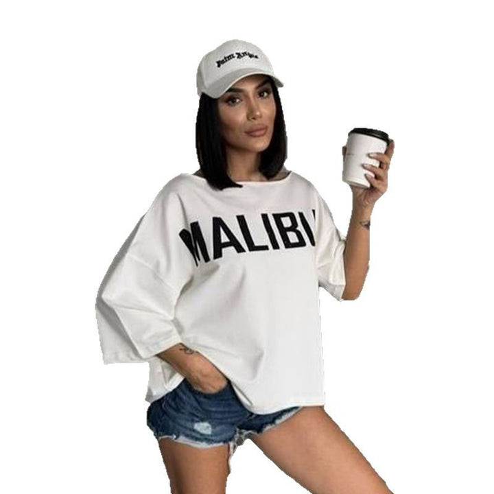 Oversized T-shirt for ladies with asymmetric neckline and contrasting print Lune London