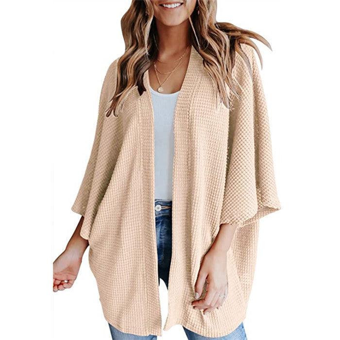 Ladies casual knit kimono with a loose fit and chic casual design