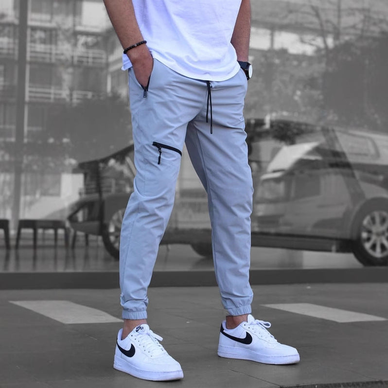 Sport suit trousers for men with elastic waistband and zip pockets on the sides Lune London
