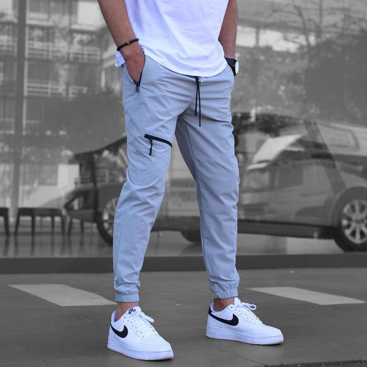Sport suit trousers for men with elastic waistband and zip pockets on the sides Lune London