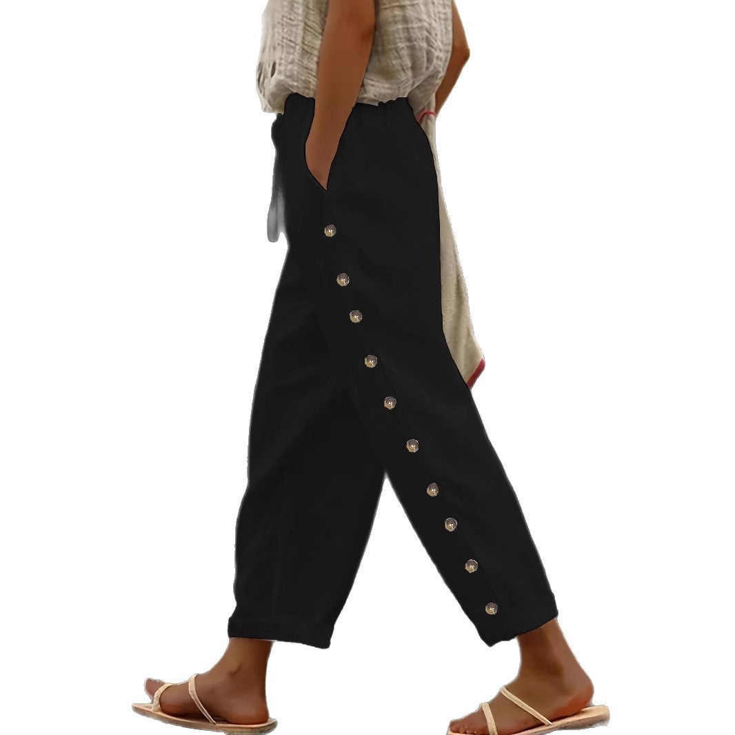 Wide trousers for women with button details on the sides and elastic waist Lune London