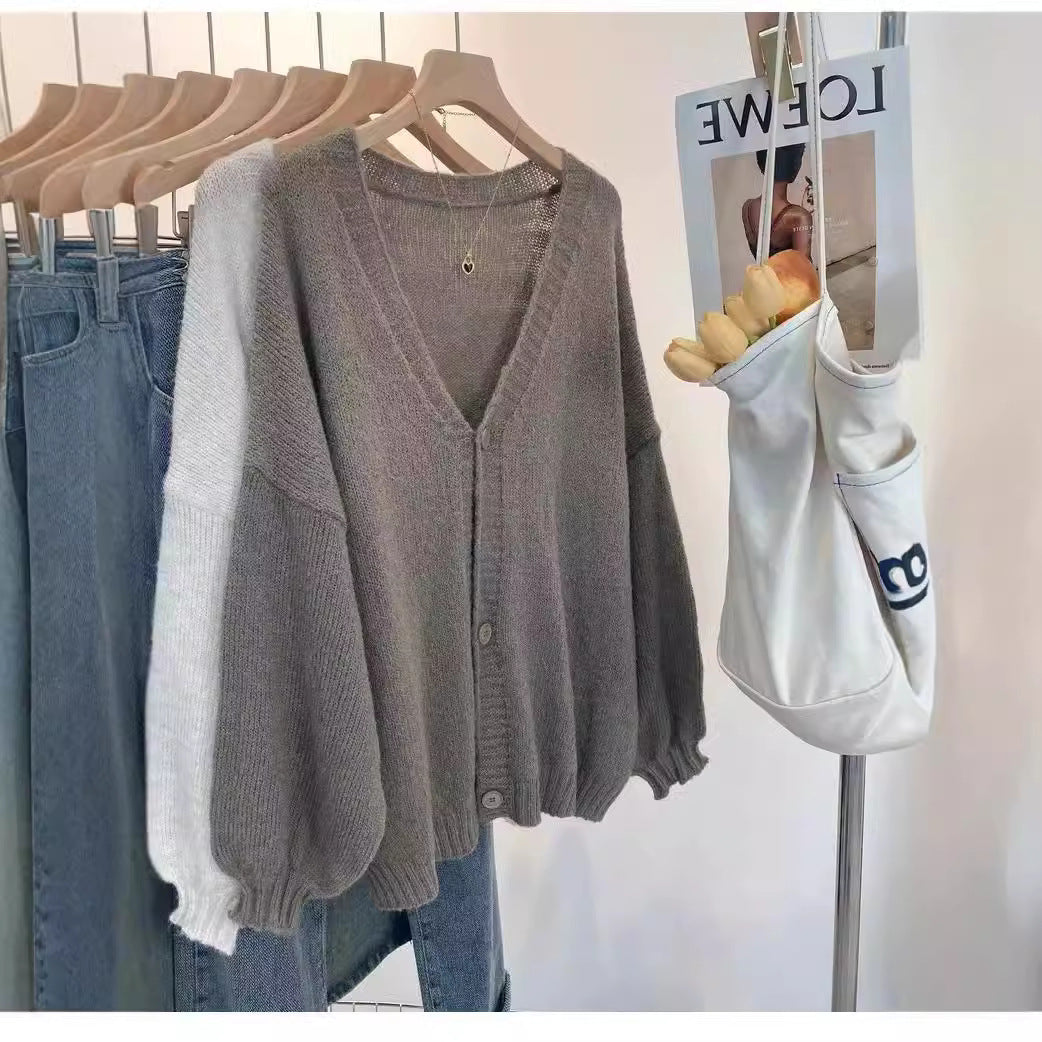 Ladies Cozy Knit Pullover with Voluminous Sleeves and Button Details Lune London