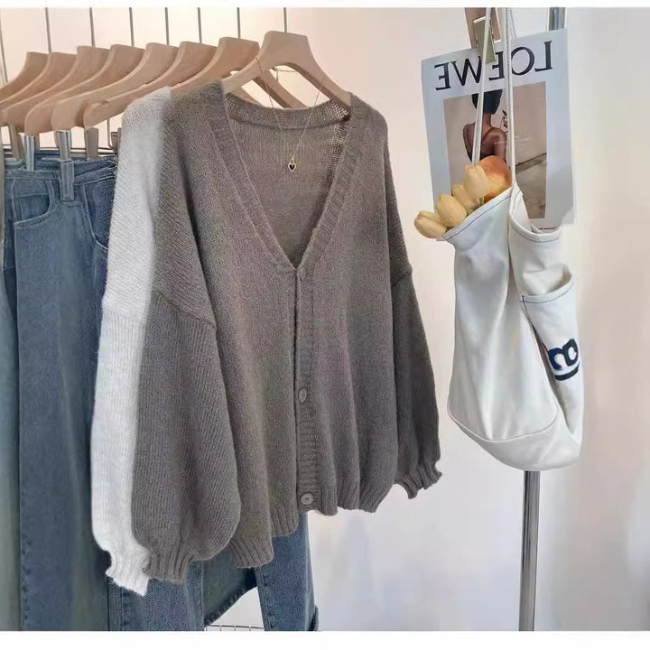 Ladies Cozy Knit Pullover with Voluminous Sleeves and Button Details Lune London