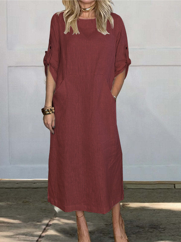 Airy midi dress for women with practical pockets and roll-up sleeves Lune London