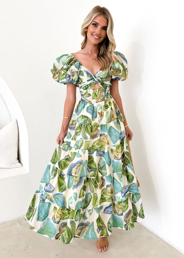 Maxi dress for women with a sophisticated design featuring off-the-shoulder and voluminous puff sleeves Chic & Stil