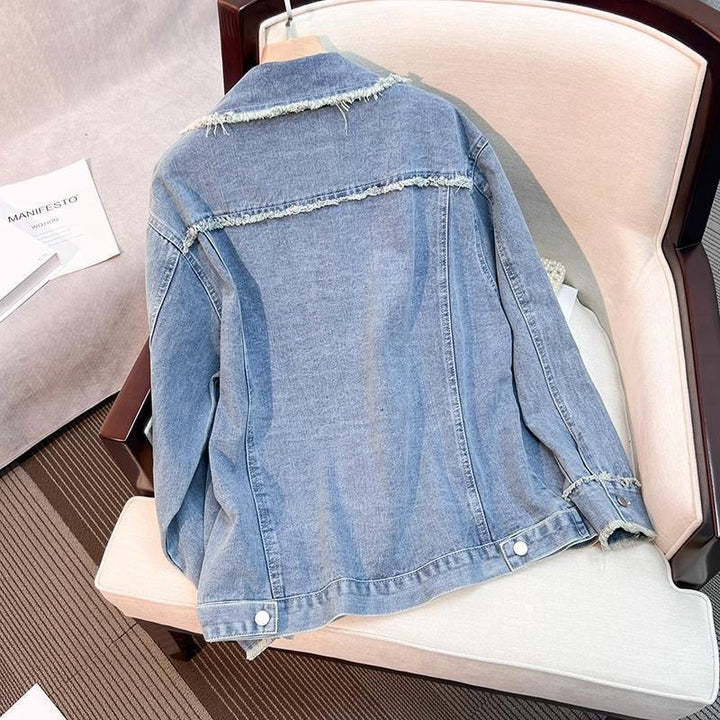 Veste en denim tendance pour femmes avec des détails effilochés Chic & Stil