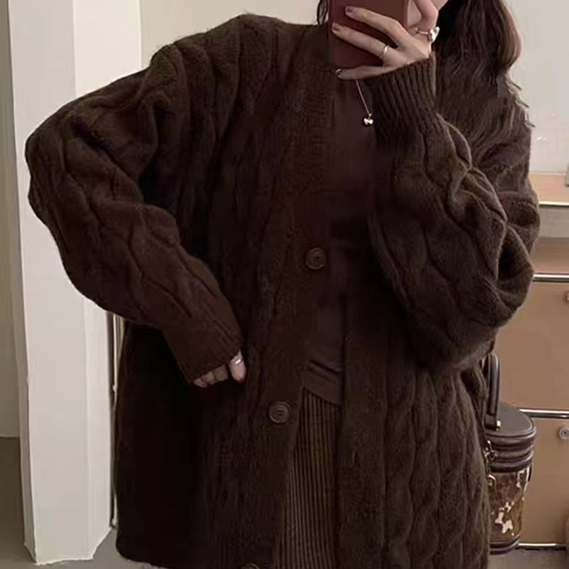 Thick knitted cardigan for women with classic cable patterns and a relaxed fit Lune London