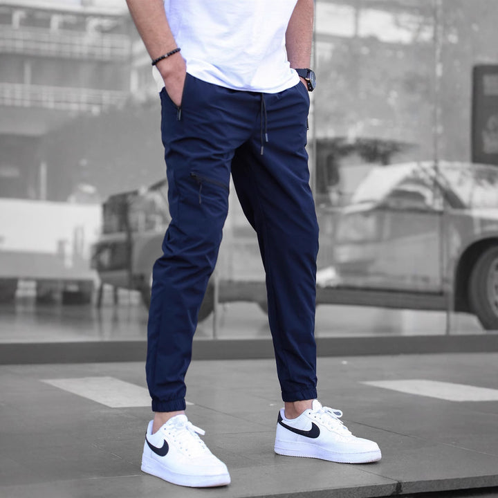 Men's sporty leisure pants with elastic waistband and practical zip pockets Lune London