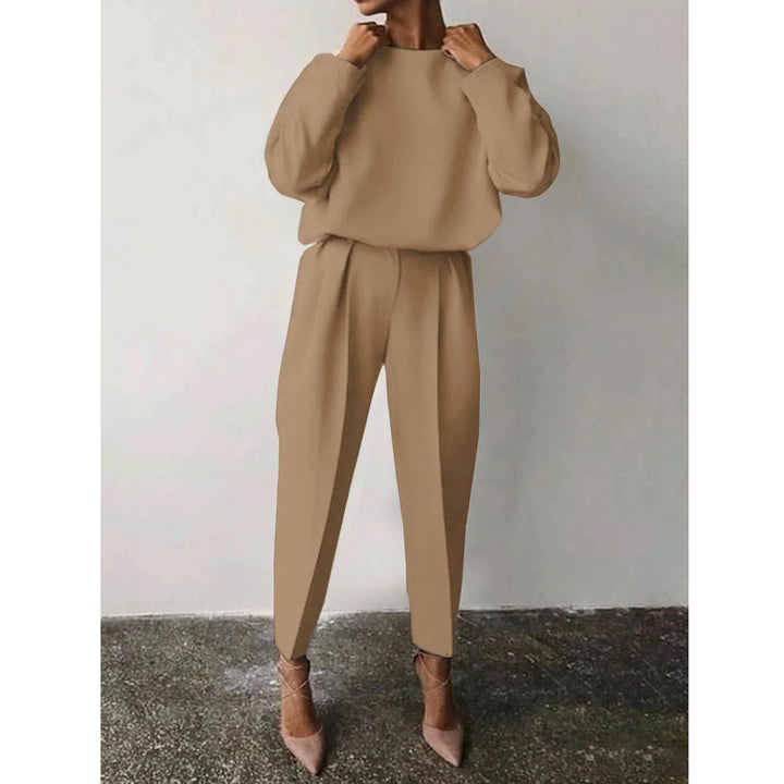 Trendy women's jumpsuit with loose fit and elegant puffed sleeves Lune London