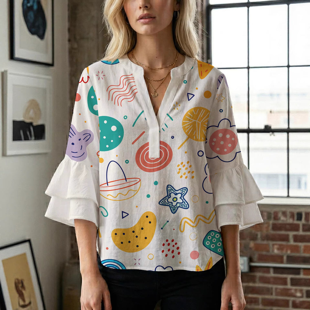 Women’s blouse with voluminous ruffled sleeves and floral pattern Lune London