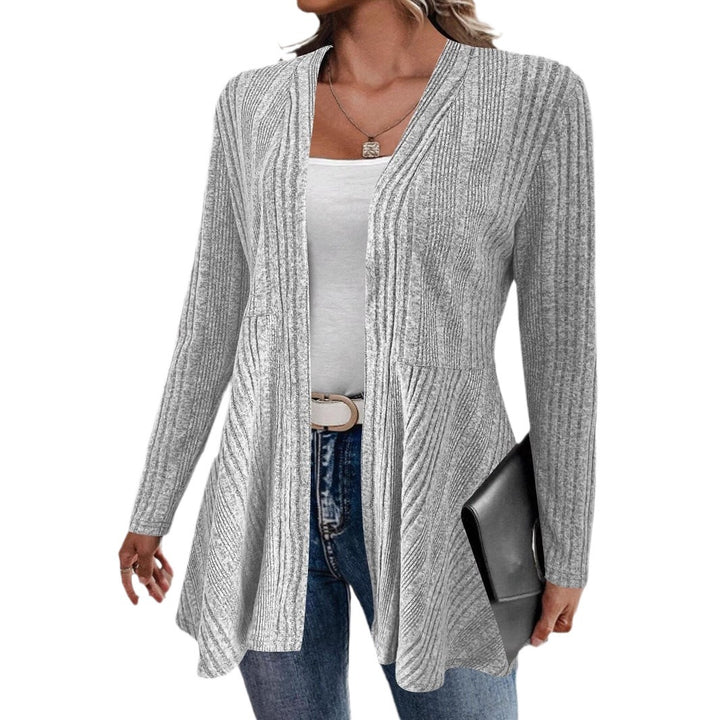 Women’s knitted jacket with a playful design and a chic side belt.