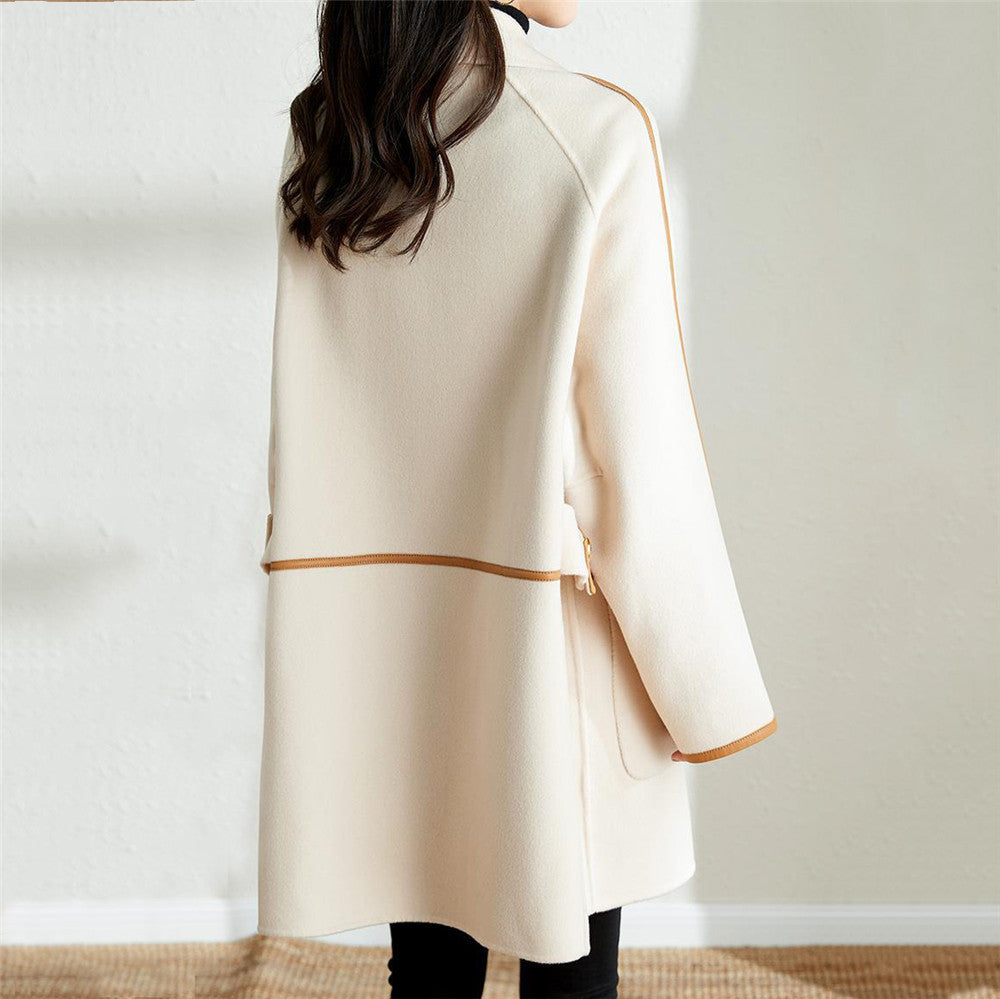 Trendy double-breasted coat for women with elegant details and practical pockets Lune London