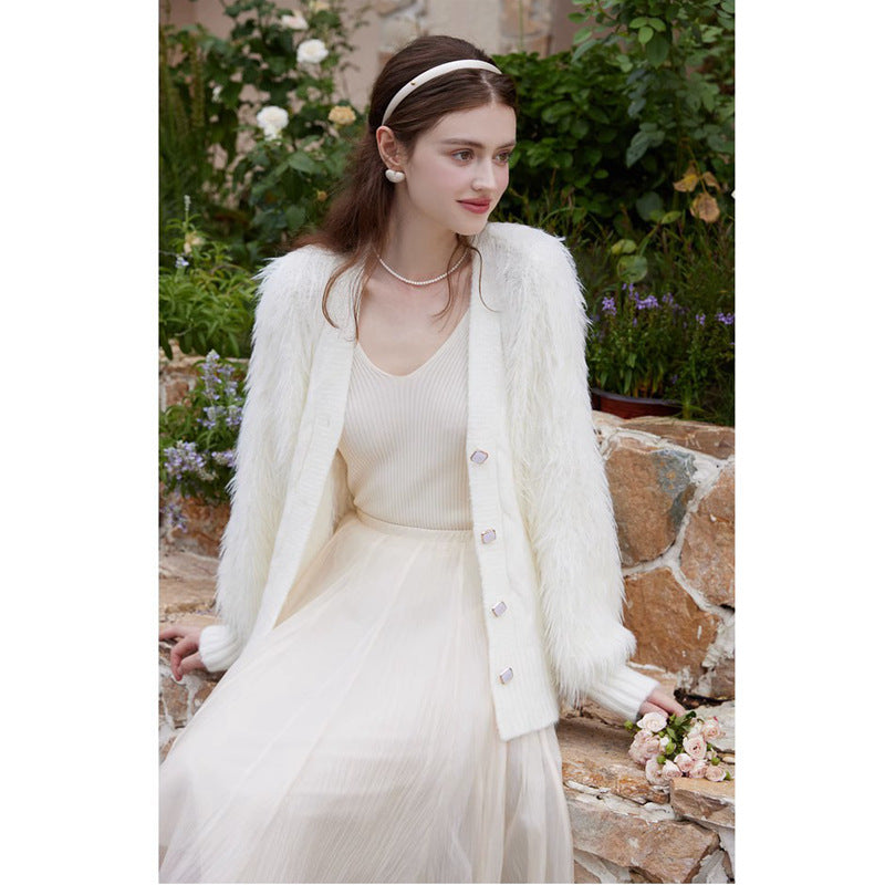 Knitted jacket for women with fluffy sleeves and button closure Lune London