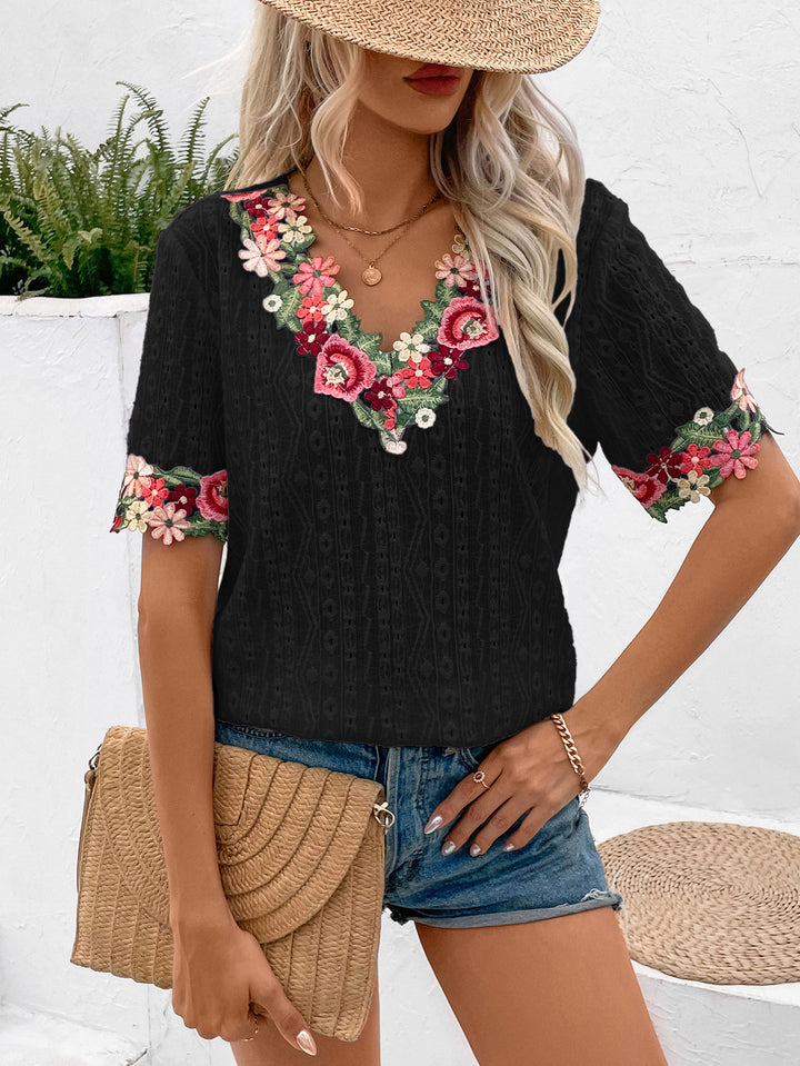 Blouse for women with floral embroidery and airy sleeves Lune London